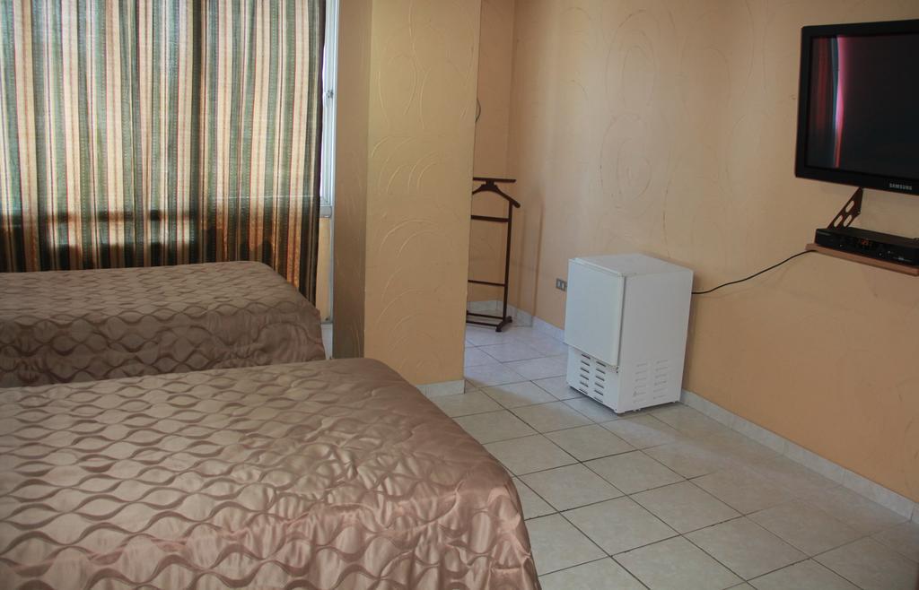 Hotel La Torre Guayaquil Oda fotoğraf